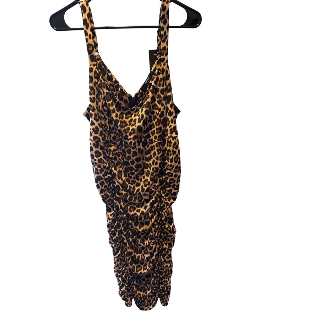 Torrid leopard print dress features dramatic ruching down the sides